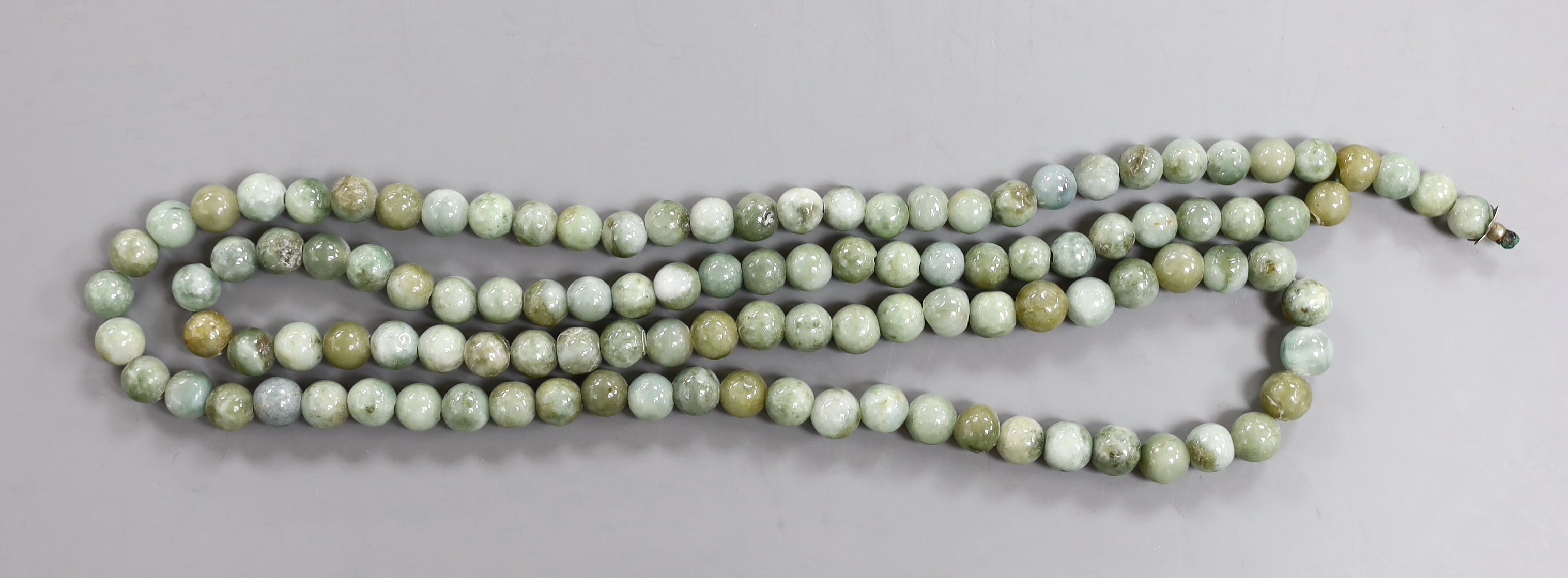 A Chinese jadeite bead necklace, 102cm.